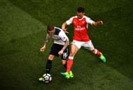 LONDON, ENGLAND - APRIL 30: Kieran Trippier of Tottenham Hotspur and Kieran Gibbs of Arsenal battle for possession during the Premier League match between Tottenham Hotspur and Arsenal at White Hart Lane on April 30, 2017 in London, England.  (Photo by Dan Mullan/Getty Images)